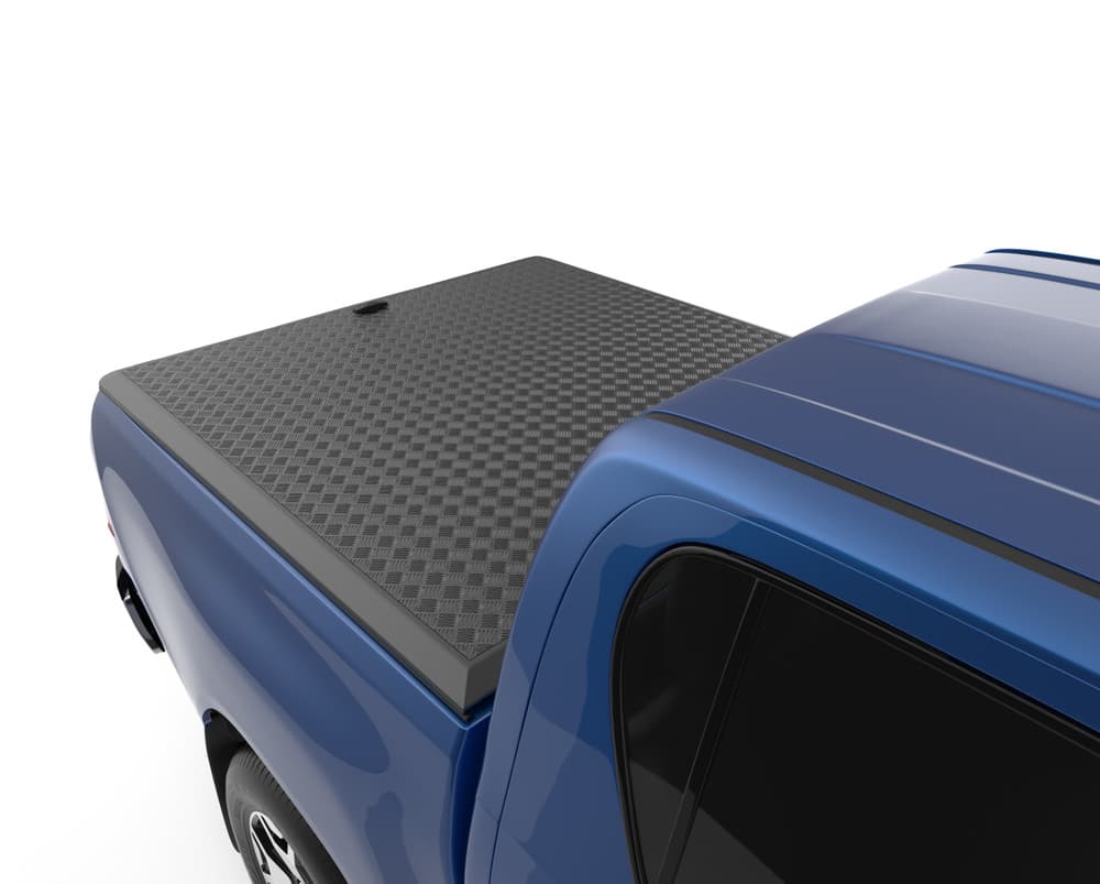 Close-up of EGR Load Shield corner detail on Toyota Hilux 2015, highlighting matte black checkerplate top