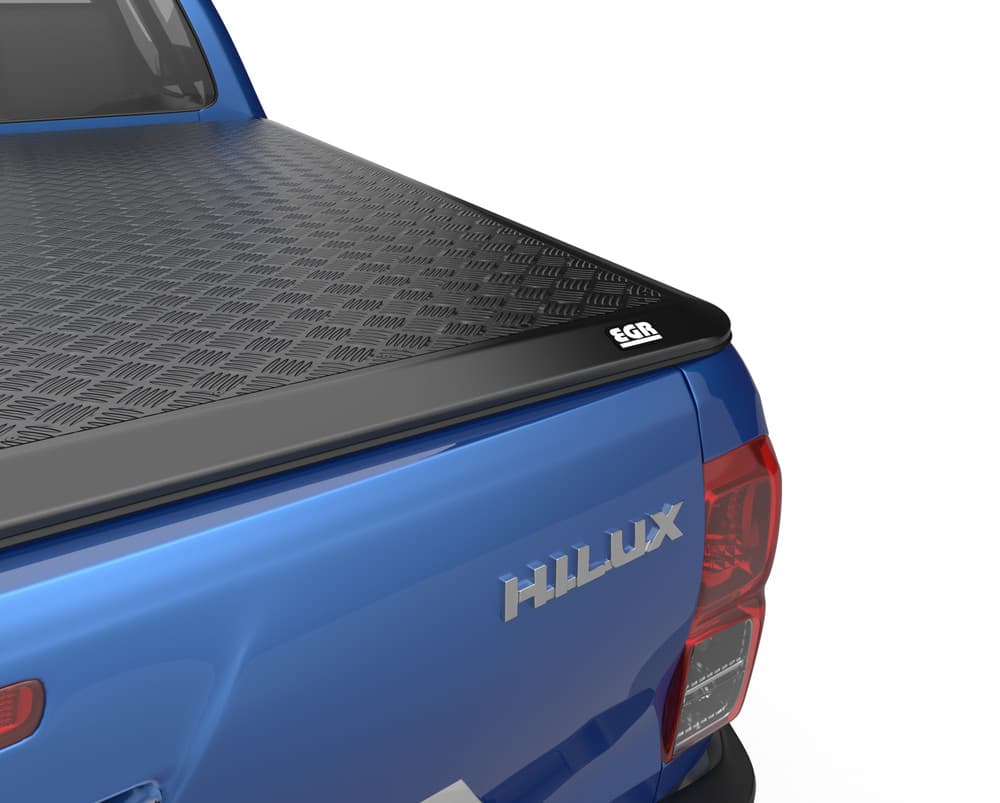 Close-up of blue Toyota Hilux 2015 Load Shield side rail and rear corner latching mechanism