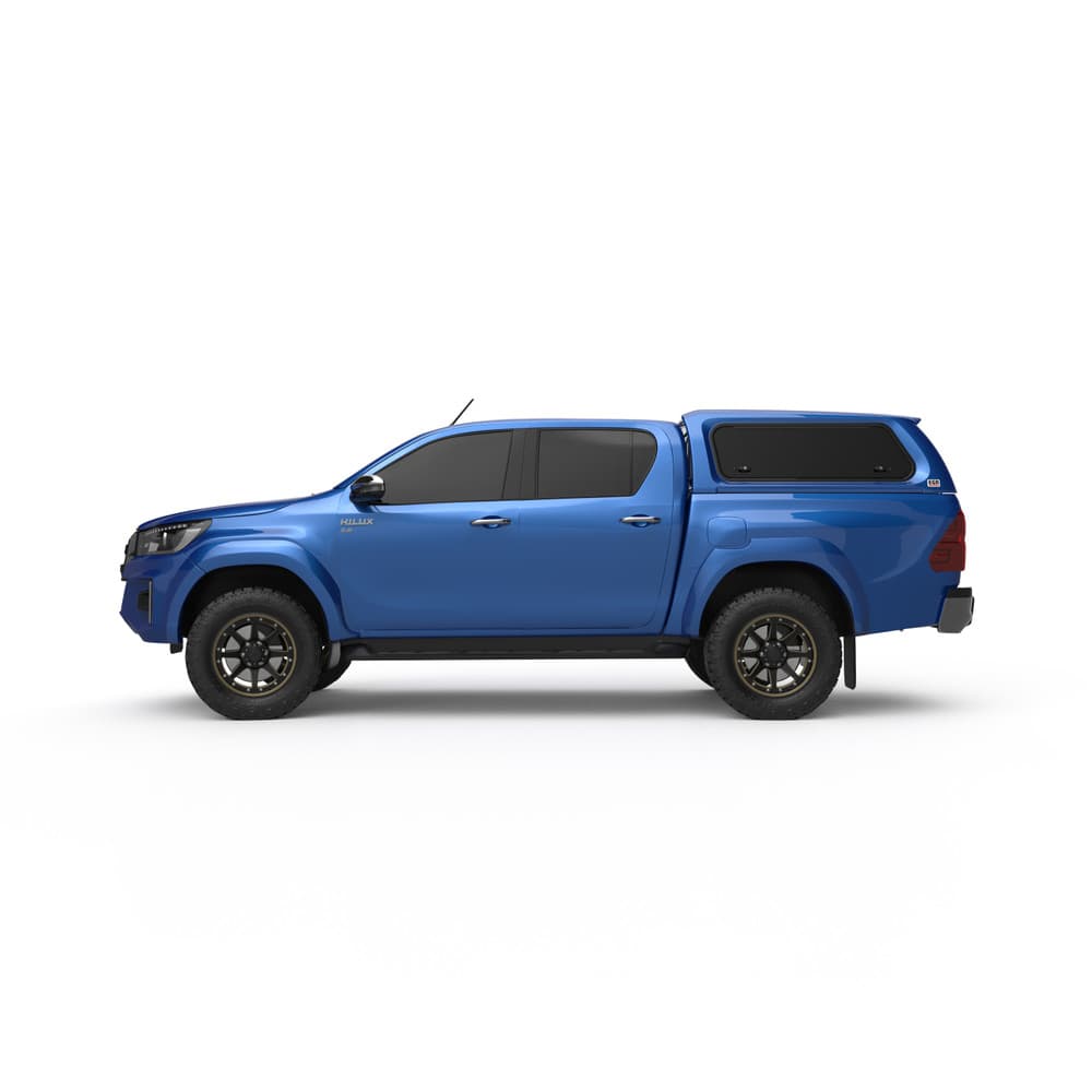 Side profile of blue Toyota Hilux fitted with EGR Premium Canopy