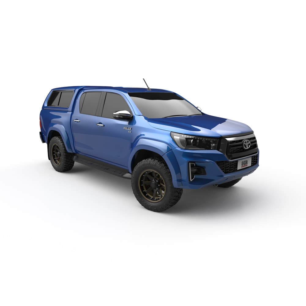 Front side view of blue Toyota Hilux with EGR Premium Canopy installed
