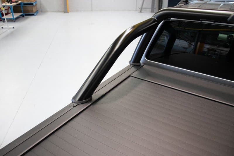 Detail view of EGR Sports Bar Adapter Kit attached to RollTrac on Ford Ranger PX, showing strong metal construction and clean fit