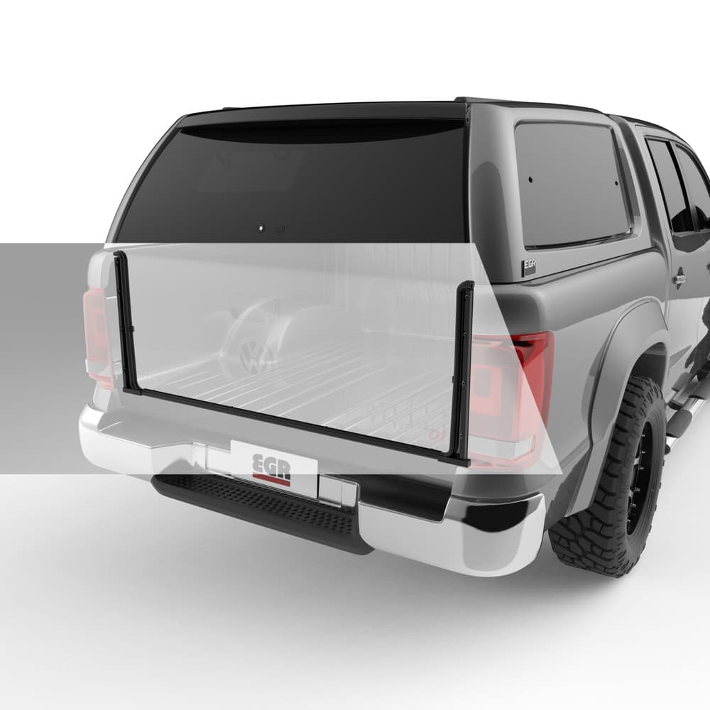 Open tailgate view of Volkswagen Amarok with EGR Dust Defender installed, highlighting sealing components that block dust and debris