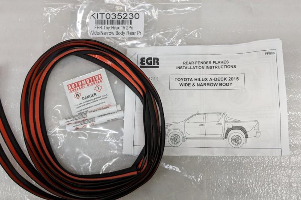 Toyota Hilux EGR Fender Flares Fitting Kit, displaying vehicle-specific brackets, fasteners, and rubber sealing for proper flare installation