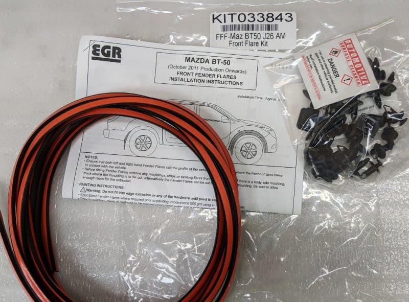 EGR Fender Flares Fitting Kit for Mazda BT-50 2011–2017, showing mounting brackets, seals, and vehicle-specific installation hardware