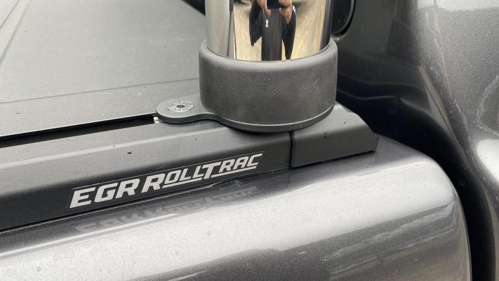 LDV T60 fitted with EGR RollTrac Sports Bar Adapter Kit, close-up showing black powder-coated adapter bracket mounted to RollTrac rail