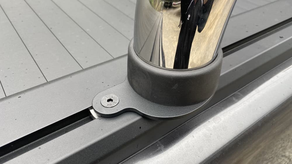 Close-up of EGR RollTrac Sports Bar Adapter Kit on LDV T60, showing raised sports bar mounting point and precision bracket fitment