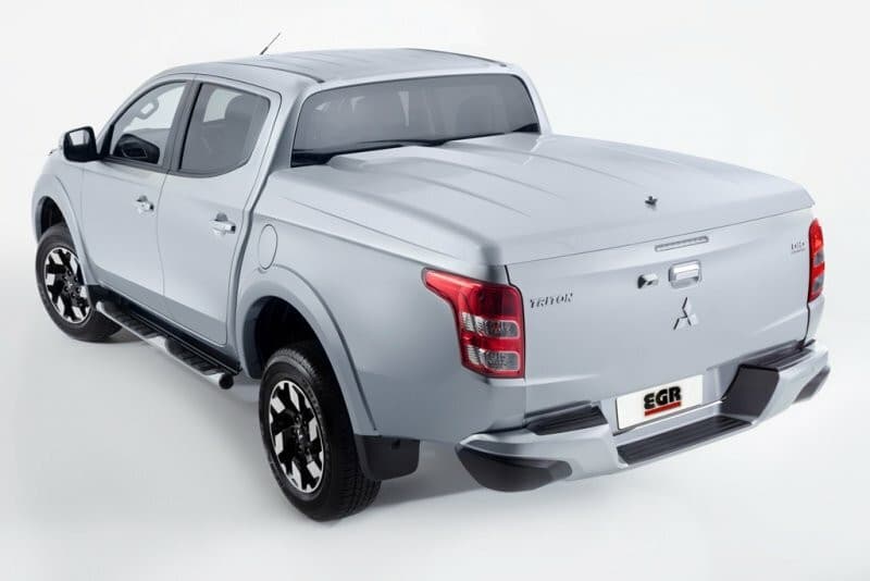 Rear three-quarter view of Mitsubishi Triton MQ/MR equipped with EGR 3 Piece Hard Lid, displaying sleek lines and sports bar integration