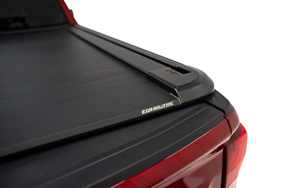 Close-up view of EGR RollTrac Electric E3 on Silverado 1500, showing flush fitment and black powder-coated roller slats