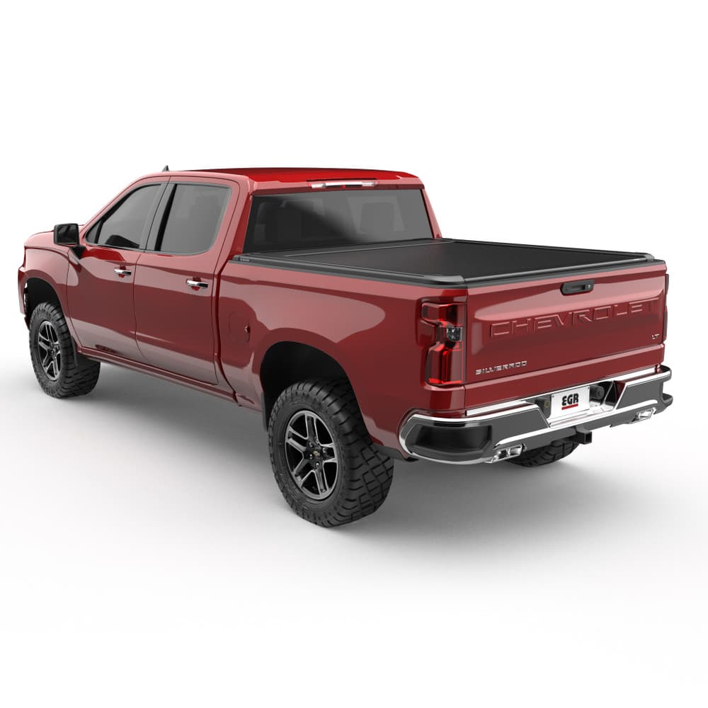 Side angle view of Chevrolet Silverado 1500 with EGR RollTrac Electric E3, highlighting sleek black aluminium roller cover