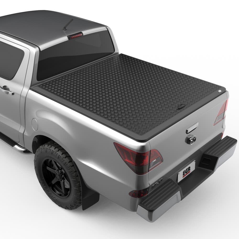 Mazda BT-50 fitted with EGR Load Shield, rear three-quarter view showing matte-black checker-plate aluminium tray cover