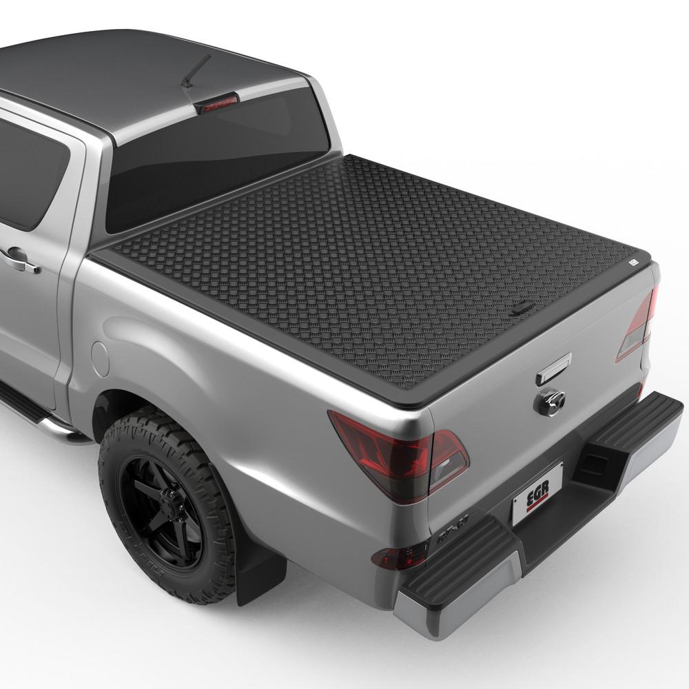 Mazda BT-50 fitted with EGR Load Shield, rear three-quarter view showing matte-black checker-plate aluminium tray cover