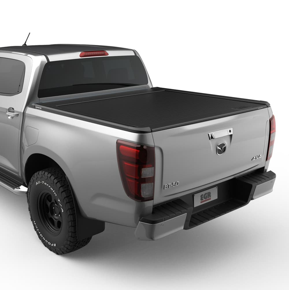 Mazda BT-50 2021 fitted with EGR RollTrac Manual, rear three-quarter view showing low-profile black aluminium roller cover