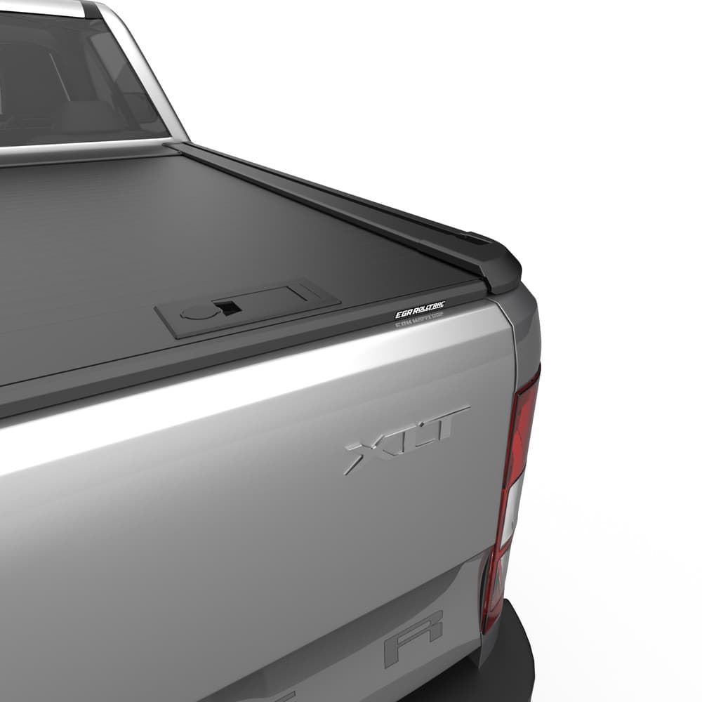 Rear corner view of Ford Ranger PX/PXII/PXIII with EGR RollTrac Manual partially open, highlighting latch handle and interlocking slats