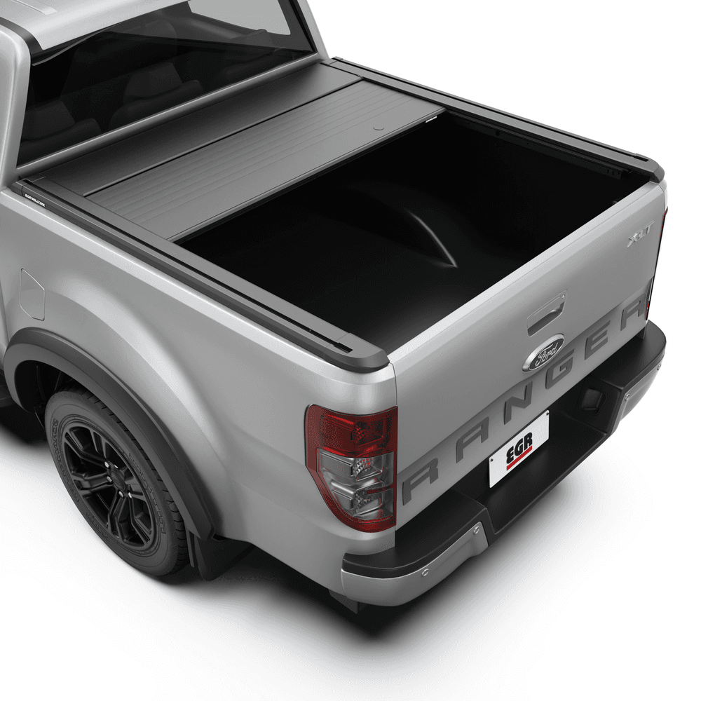 Ford Ranger fitted with EGR RollTrac Electric E3 cover opened midway, showing load-area access and side-rail controls