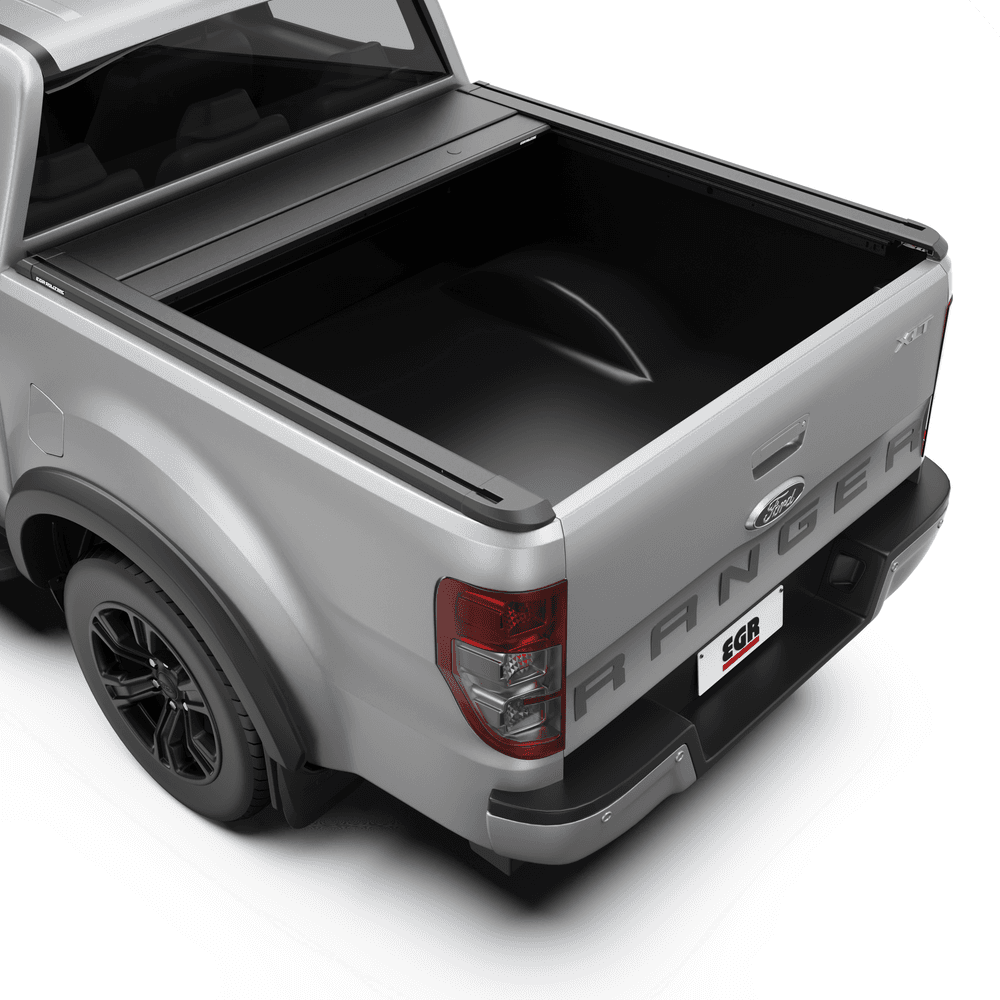Rear three-quarter view of Ford Ranger PX showcasing the EGR RollTrac Electric E3 tonneau cover in closed position