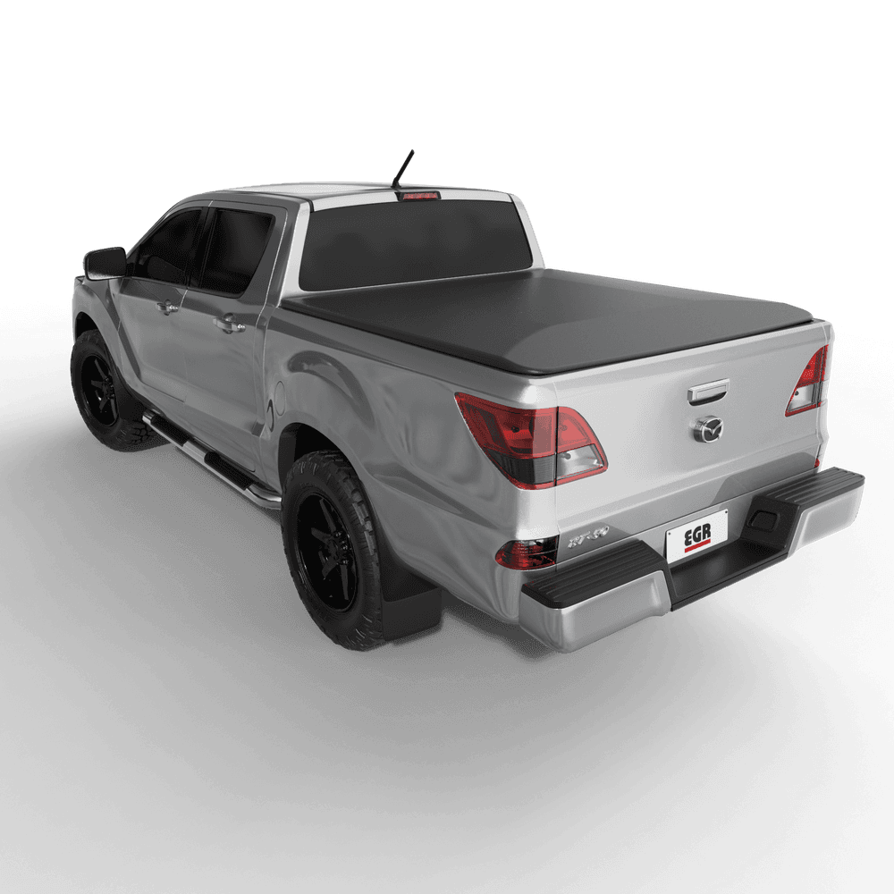 Side rear angle of a Mazda BT-50 showing the installed EGR No-Drill Soft Tonneau Cover with a clean top-mount fit