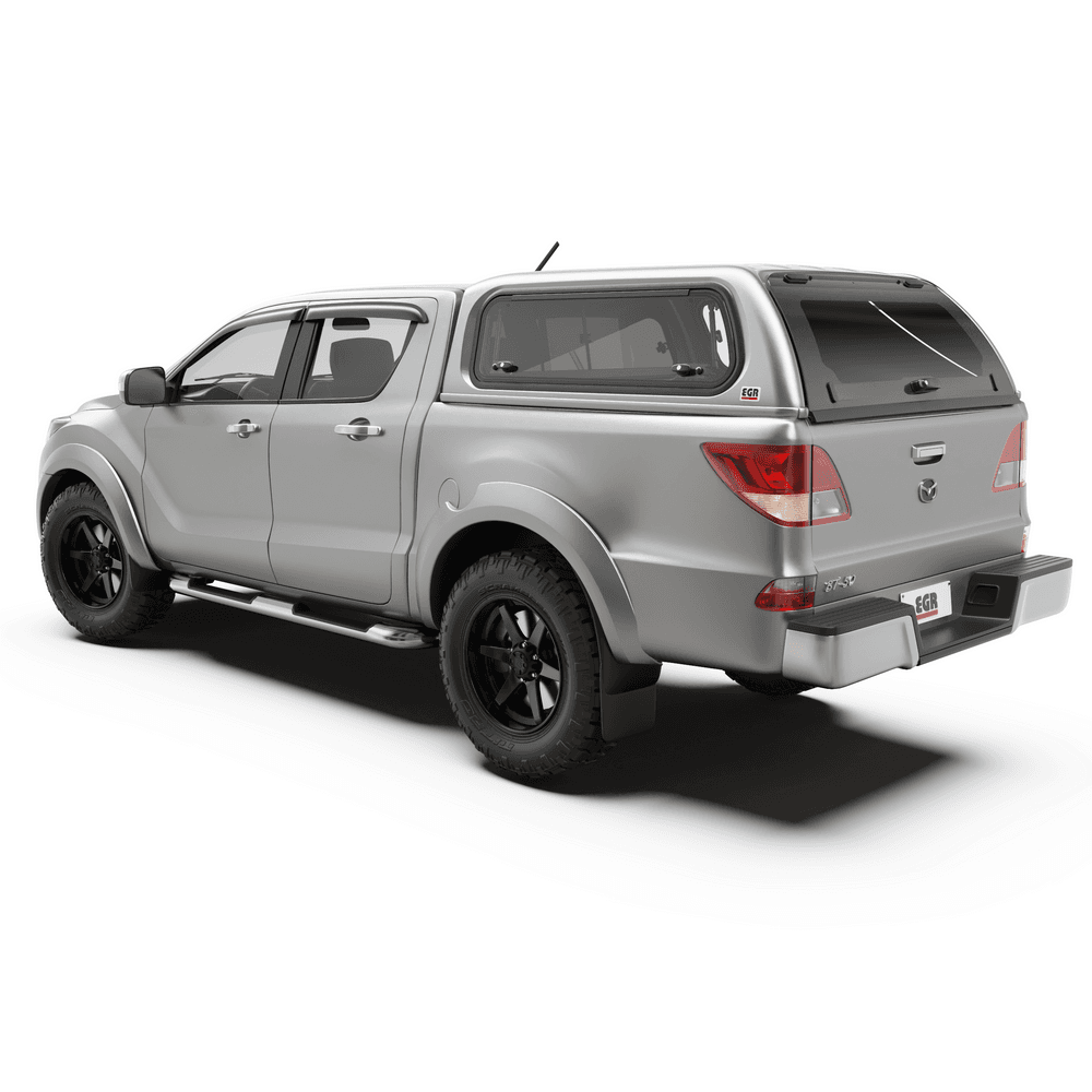 Rear-side view of a Mazda BT-50 2011-2019 fitted with an EGR Premium Canopy in OEM-matched silver with frameless tinted windows