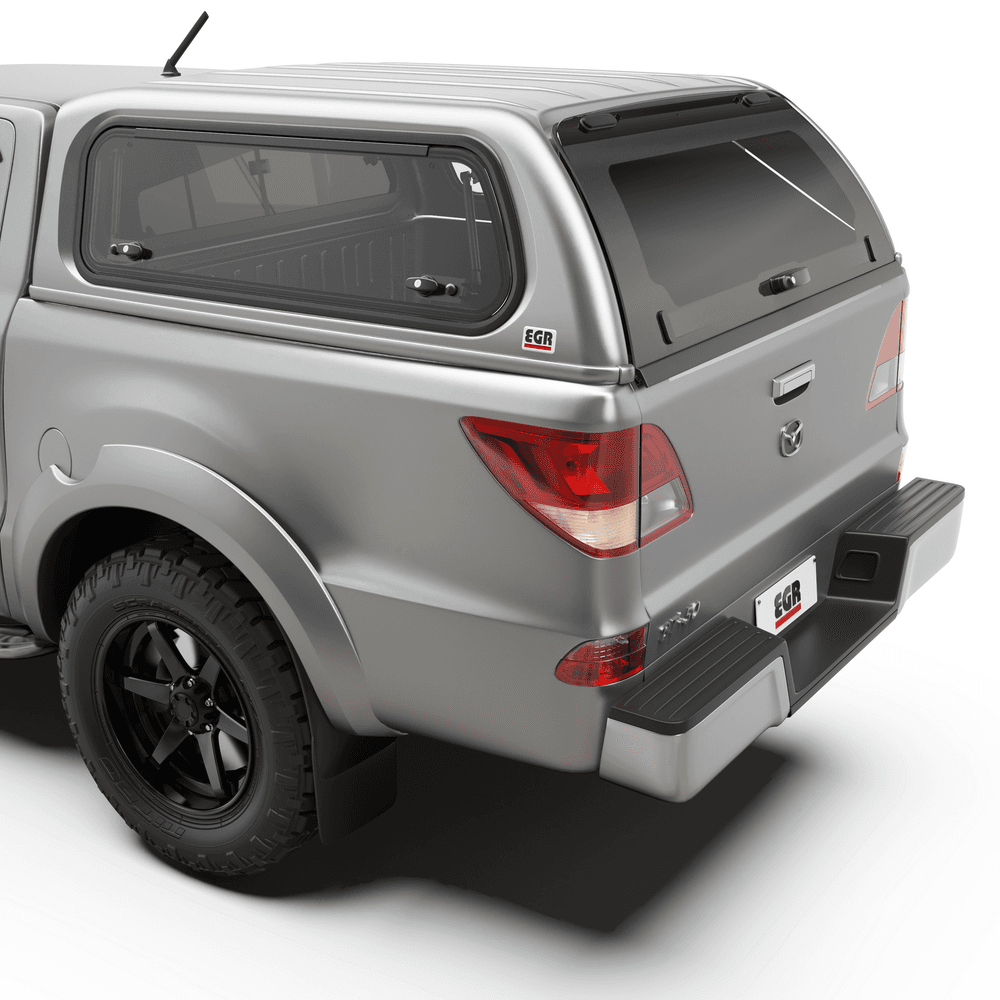 Rear view of a Mazda BT-50 featuring the EGR Premium Canopy with a tinted frameless rear window and integrated locking system