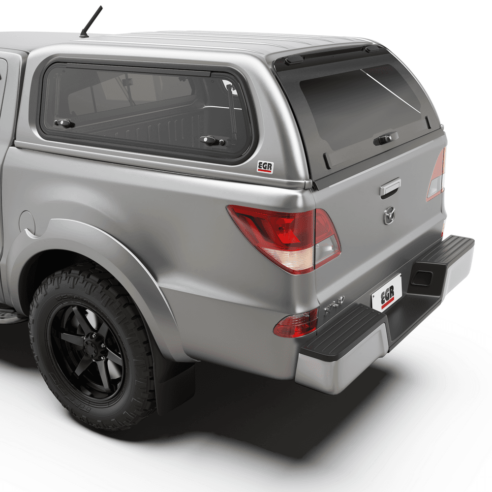 Rear view of a Mazda BT-50 featuring the EGR Premium Canopy with a tinted frameless rear window and integrated locking system