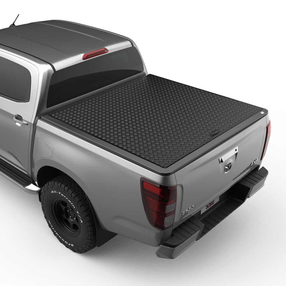 Rear-side view of a Mazda BT-50 2020 fitted with an EGR Load Shield hard cover in matte black checker-plate finish