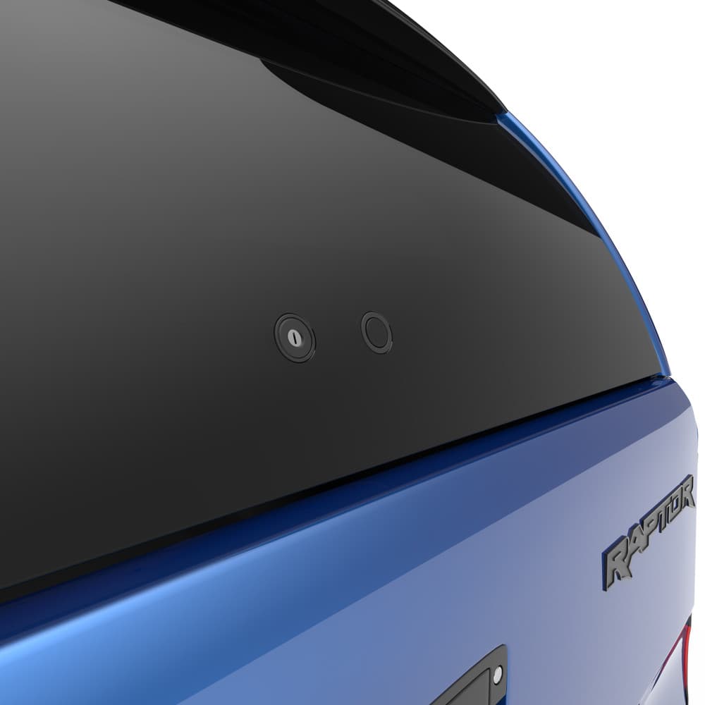 Close-up of the Ford Raptor canopy’s tinted frameless side window with smooth ABS finish