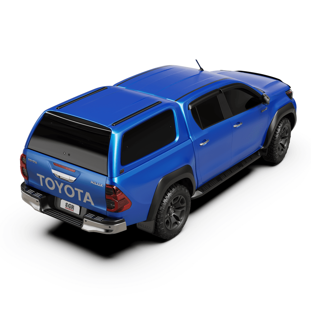 Side profile of Toyota Hilux showcasing the EGR GEN3 Canopy with frameless windows
