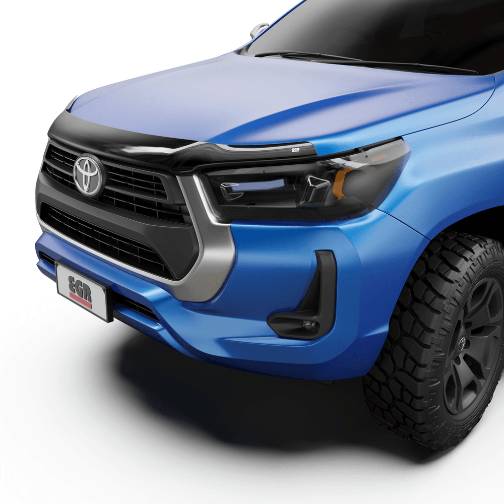 Front view of Toyota Hilux with EGR matte bonnet protector and clear headlight protectors