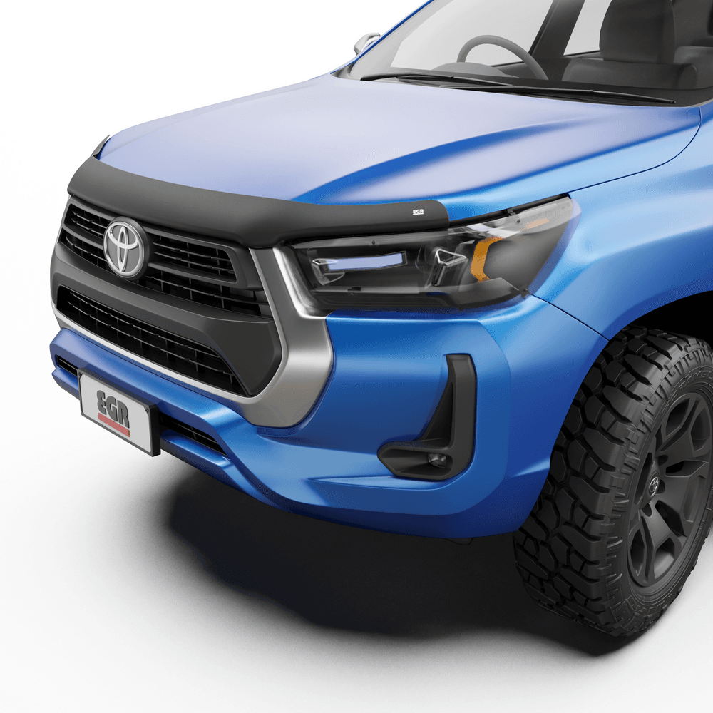 Front view of Toyota Hilux with EGR matte bonnet protector and clear headlight protectors