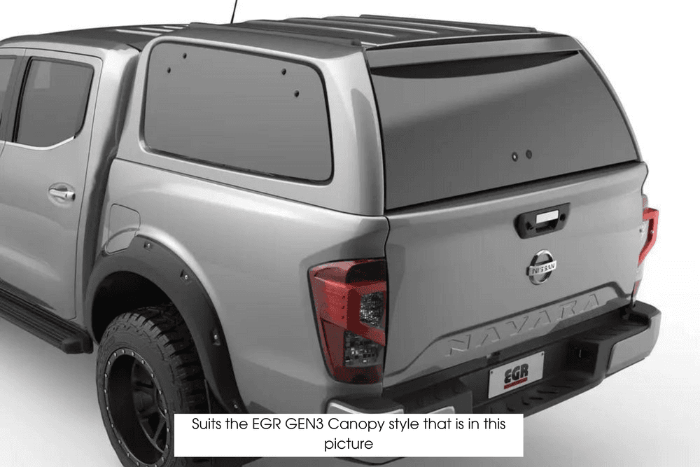 Silver Nissan Navara with an EGR GEN3 canopy showing the rear door and side panels, illustrating the canopy style compatible with the GEN3 rear door spoiler