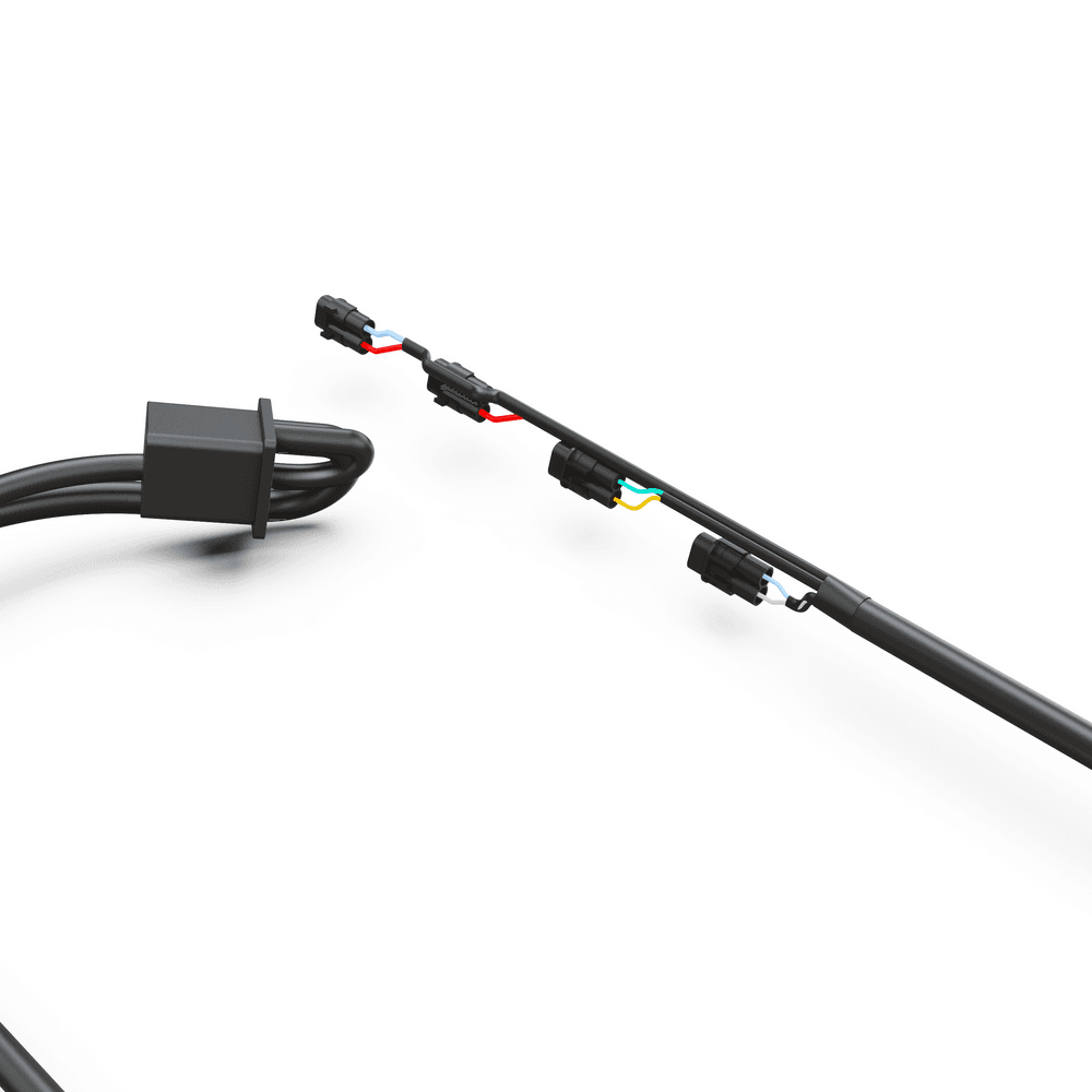 Close-up of RollTrac Side Rail Loom Kit wiring harness connectors, showing durable insulation and secure plug fittings for consistent power delivery.