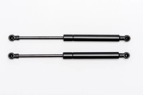 EGR replacement gas strut kit for hard lid and canopy applications, showing two black 697mm gas struts for smooth lifting and secure support