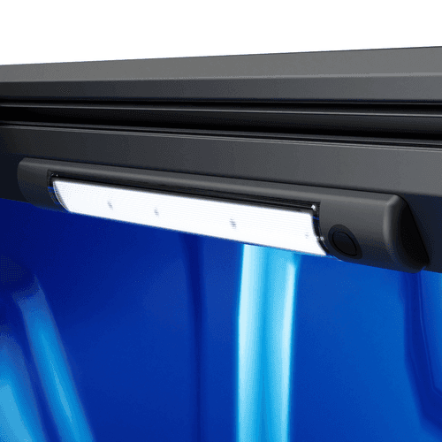 Close-up of EGR RollTrac LED Lighting Kit mounted inside electric RollTrac side rail, showing bright tub illumination