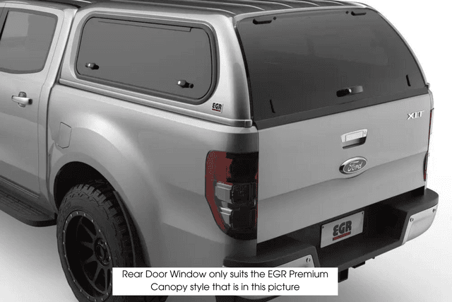 EGR Premium Canopy rear door upgrade kit fitted to Nissan Navara D40, showing replacement rear door with tinted window and secure latch design