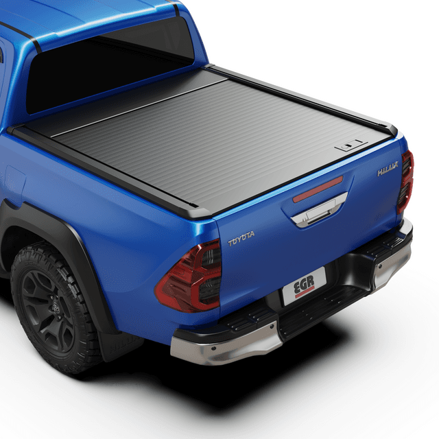 Rear three-quarter view of a Toyota Hilux 2015–2020 fitted with the EGR Auto RollTrac Manual Roller Cover closed