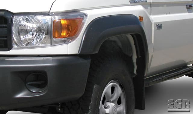 Toyota LandCruiser 70 Series Ute front quarter view showcasing EGR Fender Flares in Ultra Matte Black, fitted to enhance wheel coverage and off-road protection