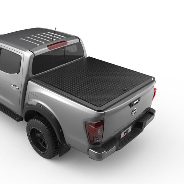 Nissan Navara MY21 fitted with EGR Load Shield showing matte-black aluminium checkerplate cover and secure tub protection – rear three-quarter angle