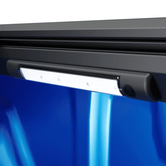 Close-up of EGR RollTrac LED Lighting Kit mounted inside electric RollTrac side rail, showing bright tub illumination