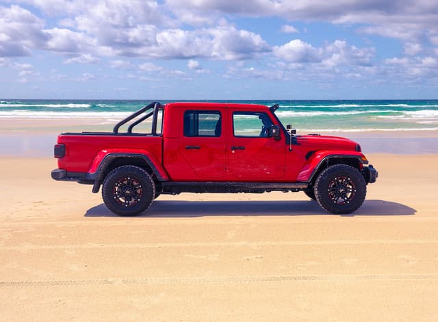 Ute fitted with EGR RollTrac Sports Bars, side profile showing black powder-coated finish and integrated RollTrac mounting